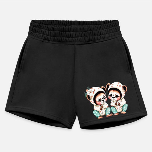 Twin Baby Sifakas Wearing Matching Pajamas